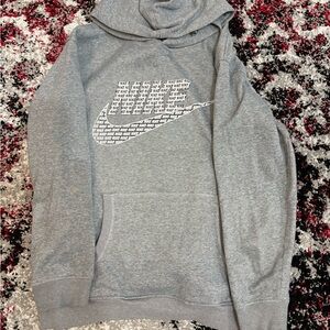 Nike Men’s Gray Crewneck Hoodie with Repeated Swoosh Print